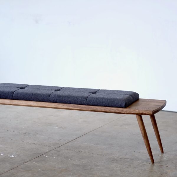 Mid Century Modern Bench in walnut with gray wool upholstery.