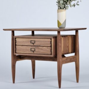 Midcentury Furniture: a walnut nightstand. The box with two drawers appears to float under the table top.